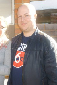 The author portraying the role of "Year-Ago-Me" (An idiot in reflection)